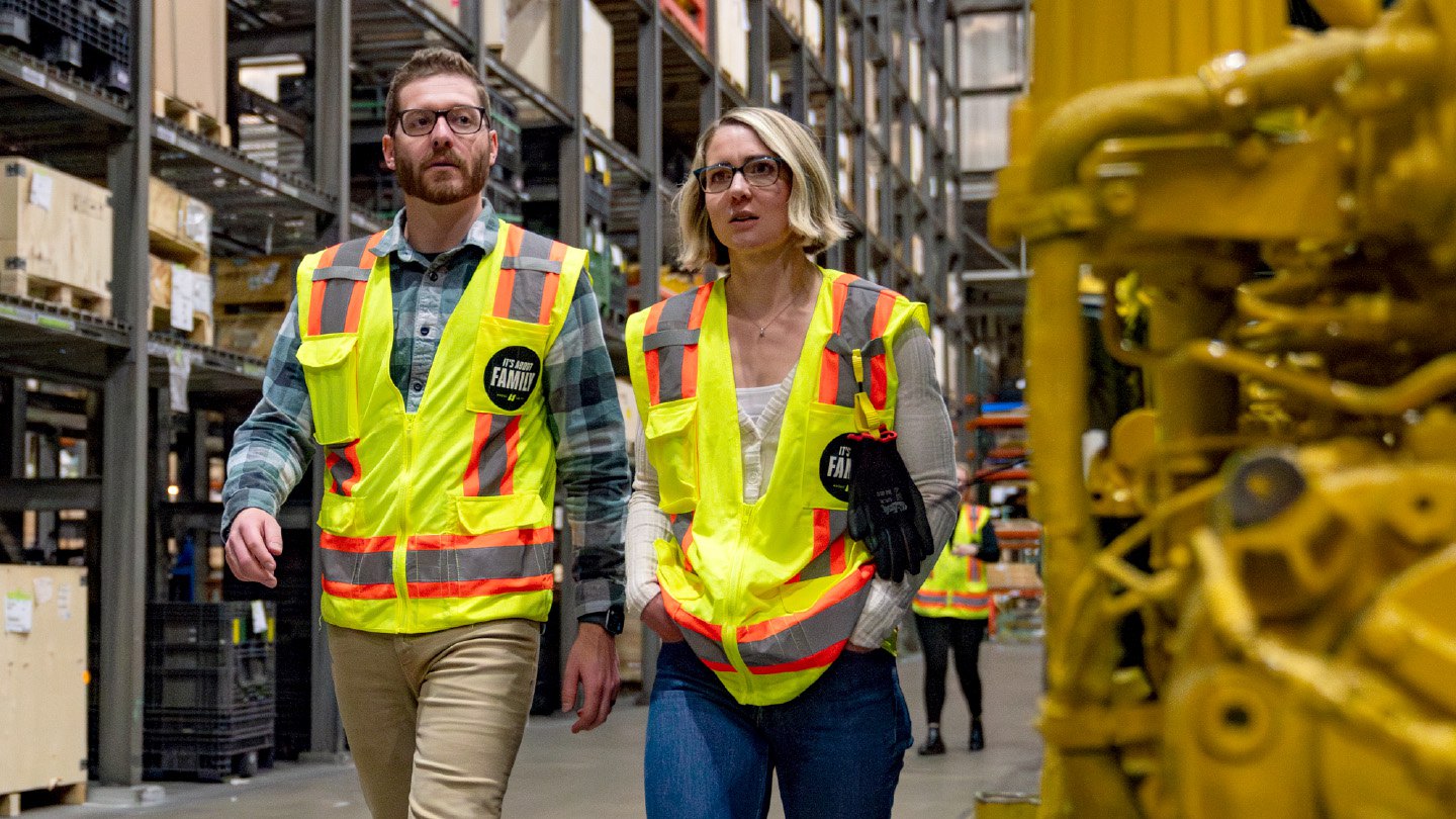 Zach Hodge and Jordan Fullan wearing safety vests